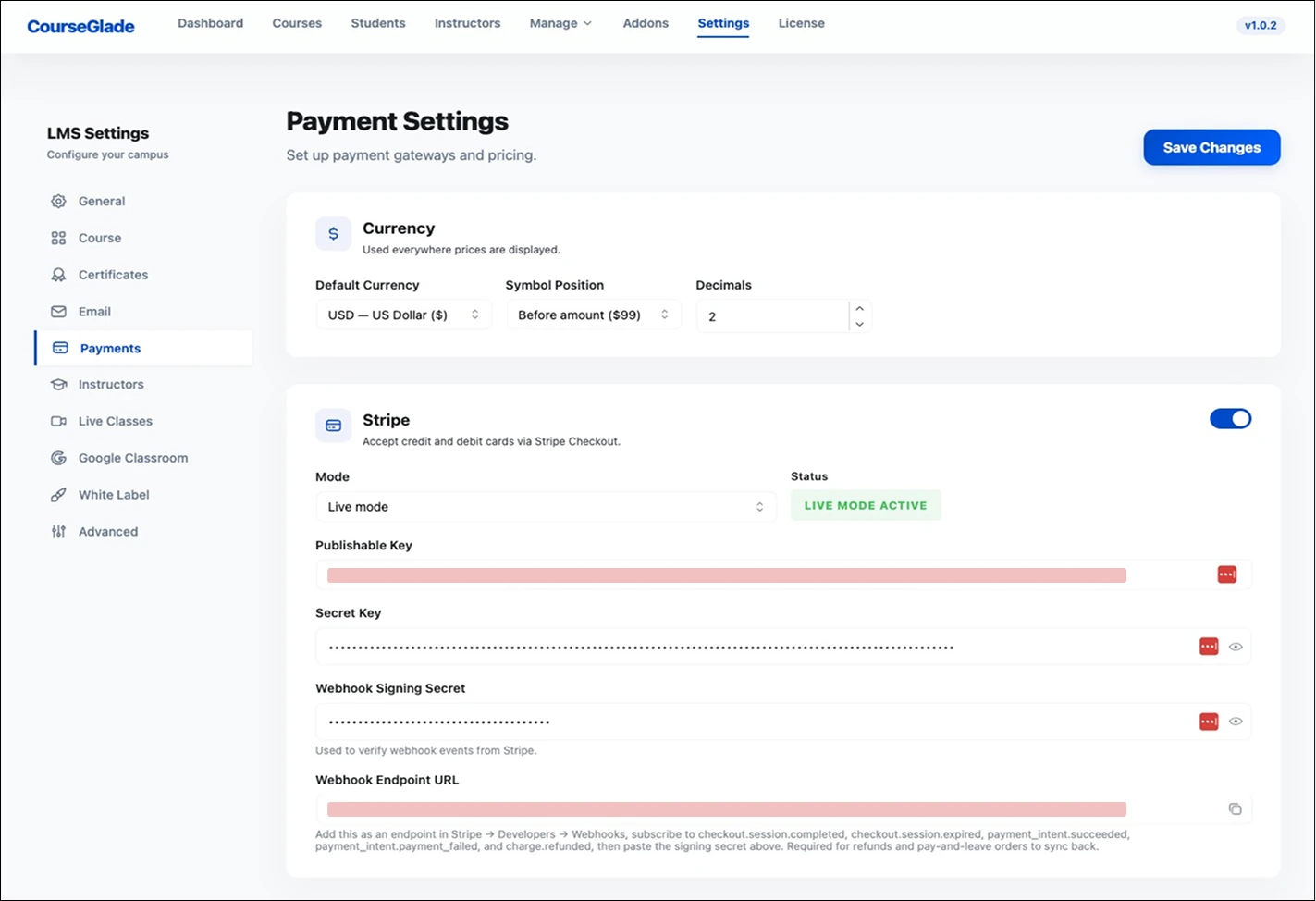 Payment Settings with a Currency card above the Stripe card, which holds an enable toggle, a mode select showing Live mode with a matching status badge, and fields for publishable key, secret key, webhook signing secret and the webhook endpoint URL